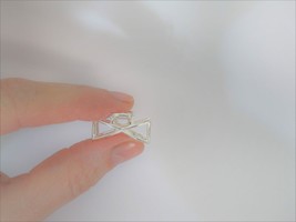 Tiny small silver tone bow shaped metal hair claw clip - $5.95