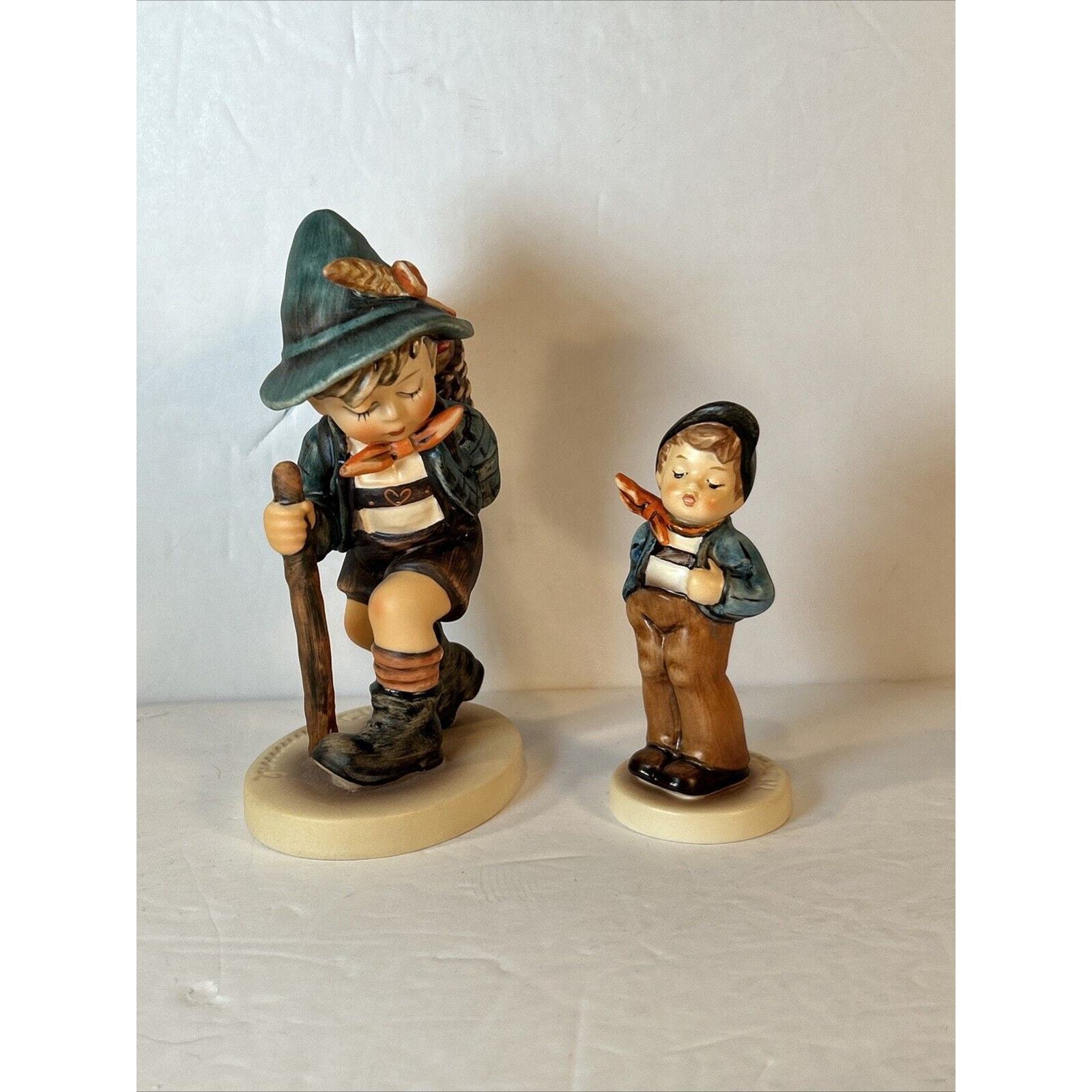 Goebel Hummel Flower Vendor #381 1971 and Lucky Fellow #560 - £18.19 GBP