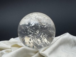 Clear Quartz Sphere with Unique Spider Inclusion for Spiritual Protection - $1,230.76 MXN