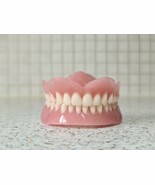 Full upper and lower dentures/false teeth, Brand new. - $135.00
