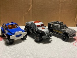 Lot of 3 Matchbox 4x4 Truck Buggy Road Raider Police truck Outdoor Adven... - $6.79