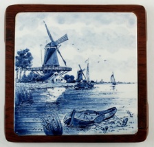2 Blue & White Delft Windmill Tile & Wood Trivets - $92.02 MXN 2 Blue & White Delft Windmill Tile & Wood Trivets - $92.02 MXN