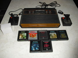 Atari 2600 4 Switch With Joysticks, Adapter, 7 Games Combat, Asteroids,Defender - $148.49