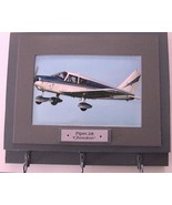 Wall Mounted Keychain Rack with a 4"X6" print of a Piper PA28 Cherokee aircraft. - $17.77