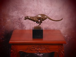 Majestic Bronze Sculpture Of A Running Cougar – A Tribute To Wild Elegance - $229.00