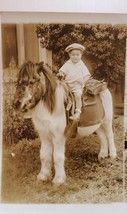 Rppc  Boy On A Shetland Pony wearing White shirt shorts and cap undivided - $23.28