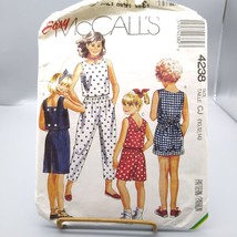 Vintage Sewing PATTERN McCalls 4238, Girls Easy 2006 Tops Skirt and Pants - $7.85