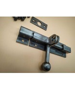 An industrial door latch, handcrafted from steel in a rustic style, ensu... - $36.80