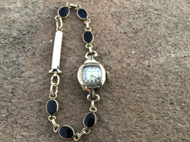 BULOVA Ladies Wristwatch Yellow Gold Filled 17 Jewel Works With Black On... - $51.43