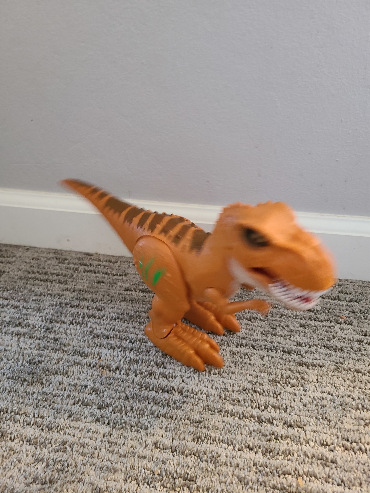 ZURU Robo Alive T-Rex Robotic Pet with Dino Walks Glow Scars  - $11.00