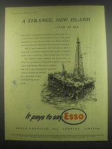 1949 Esso Oil Ad - A strange, new island - far at sea - $18.49