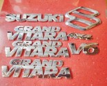 Genuine Used SUZUKI GRAND VITARA EMBLEM NAMEPLATE Badge 4x4 V6 COMPLETE ... - $35.99