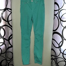 Rue 21 turquoise Midrise skinny jeans, size 7/8 short - $11.76