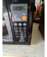 Used Magic Chef MCD770B Compact 0.7 cu. ft. Countertop Microwave 700 watts - $900.20 MXN