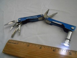 Swiss + Tech blue folding pocket knife w/ pliers, flashlight, and 4 blades NICE - £7.82 GBP