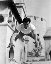 Tony Curtis Classic in t-Shirt Jumping in air 16x20 Canvas - $69.99