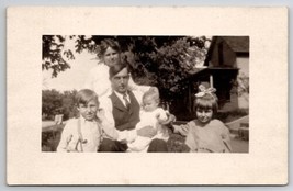 RPPC Edwardian Family Mother Father Baby On Lap Daughter Son Postcard K27 - £7.07 GBP