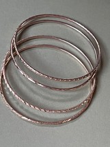 Vintage Lot of 4 Thin Various Etched Goldtone Bangle Bracelets - 2.5 inches acro - $10.21