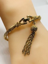 vintage gold tone bracelet with charm  7.5” - $569.47 MXN