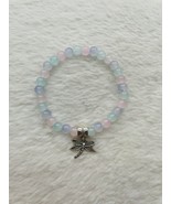 Pastel pink, purple, and blue glass bead bracelet with a dragonfly charm. - $7.00