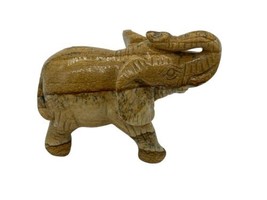 Brown Hard Plastic Elephant Faux Wood Figurine - £8.28 GBP