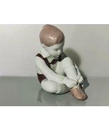 Vintage Dressing Boy w/ Shoelaces Aquincum Budapest Hungarian Porcelain Figurine - $27.69
