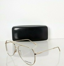 Brand New Authentic Calvin Klein Eyeglasses CK 21100 717 Gold Frame - £70.10 GBP
