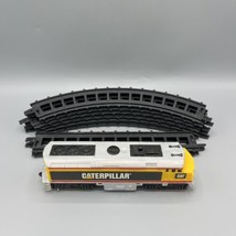 1988 Toy State #TS0006-010610 CAT Locomotive and 8 Pieces of Train Track - $19.79