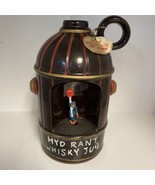 Vintage Hydrant Whisky Jug Music Box Decanter with Revolving Figure Orig... - $40.55 CAD