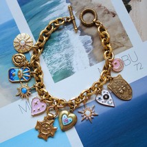 Vivian Grace Antiqued Gold Charm Bracelet - $210.00