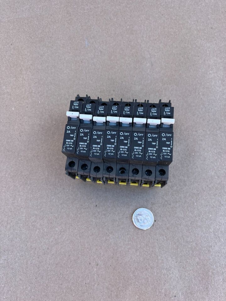Lot of 8 surplus CBI 2 amp curve 1 pole circuit breaker QL-1(13) IEC60947-2 - $74.40