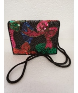 Sequin purse with long black shoulder strap black lining and snap closure - $15.00