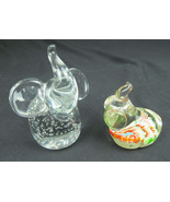 Two glass elephant paperweights or decoration - $490.94 MXN