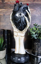 Gothic Alchemy Skeleton Hand Holding Black Anatomy Heart With Evil Eye Figurine - £26.72 GBP