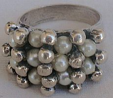White pearls and silver pearls ring