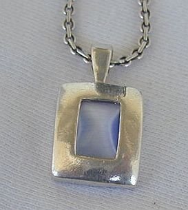 Mini light blue cat eye pendant