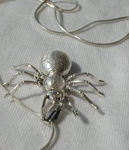 Spider silver pendant - $568.49 MXN