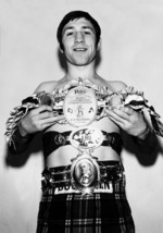 Ken Buchanan 8X10 Photo Boxing With Belts - $4.94