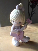 2004 Precious Moments “When You Play With My Heart, Music Is Art” Figurine  - $30.00