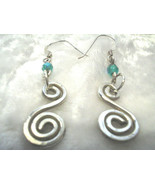 Shanrocks Hammered &amp; swirled SS earrings - $299.52 MXN