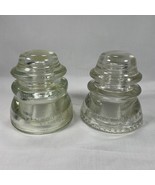 A COLLECTION OF 2- 4” HEMINGRAY INSULATORS 1 - 42 AND 1 - 45 - $17.60 CAD