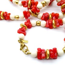 Vintage Monet Faux Coral Necklace with Elegant White and Gold Tone Beads - $57.09