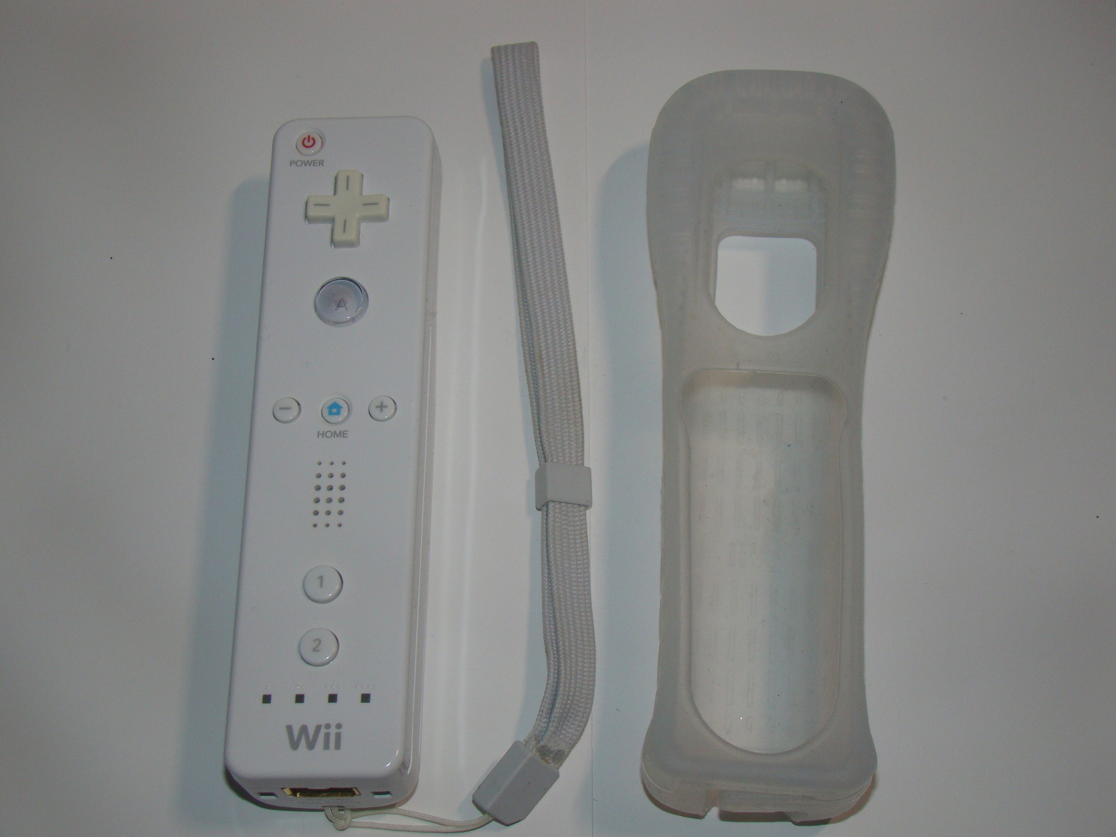 Primary image for Nintendo Wii - Official OEM Controller (Complete with Silicon Case, Wrist Strap)