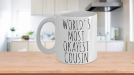 Worlds Most Okayest Cousin Mug Funny Coffee Cup Sarcastic Birthday Present - £14.86 GBP