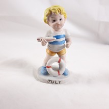 Vintage Bisque July Figurine Boy Hand Painted Lifeguard Sailboat Summer - $13.86