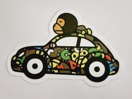 Baby Monkey Laying on Top of Car Multicolor Sticker Decal Embellishment ... - $2.30