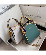 Silver Serenity: The Timeless Grace of our Grey Elegance Handbag - $27.99