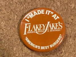 Vintage Flakey Jake&#39;s I Made It At Flakey Jakes Advertising Pinbacl Pin 2.25&quot; - £3.85 GBP