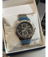 Seiko Mens Quartz Cortura SNAE73 Black Dial Chronograph Watch - $215.00