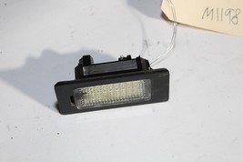 2007-10  E92 BMW 328i COUPE REAR TRUNK LID LICENSE PLATE LIGHT ILLUMINATOR M1198 image 3